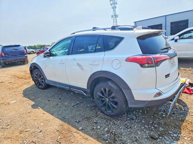 Photo 2 from auction – 2018 TOYOTA RAV4 with VIN 2T3RFREV0JW808716