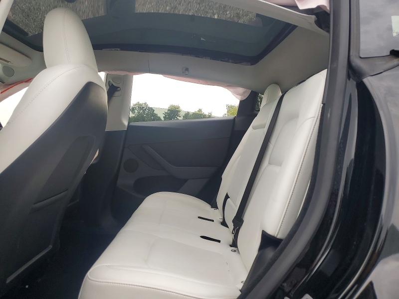 Photo 11 from auction – 2023 TESLA MODEL Y with VIN 7SAYGDEF1PF858899