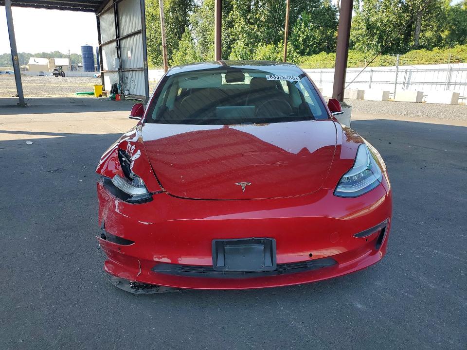 Photo 5 from auction – 2018 TESLA MODEL 3 with VIN 5YJ3E1EA6JF153930