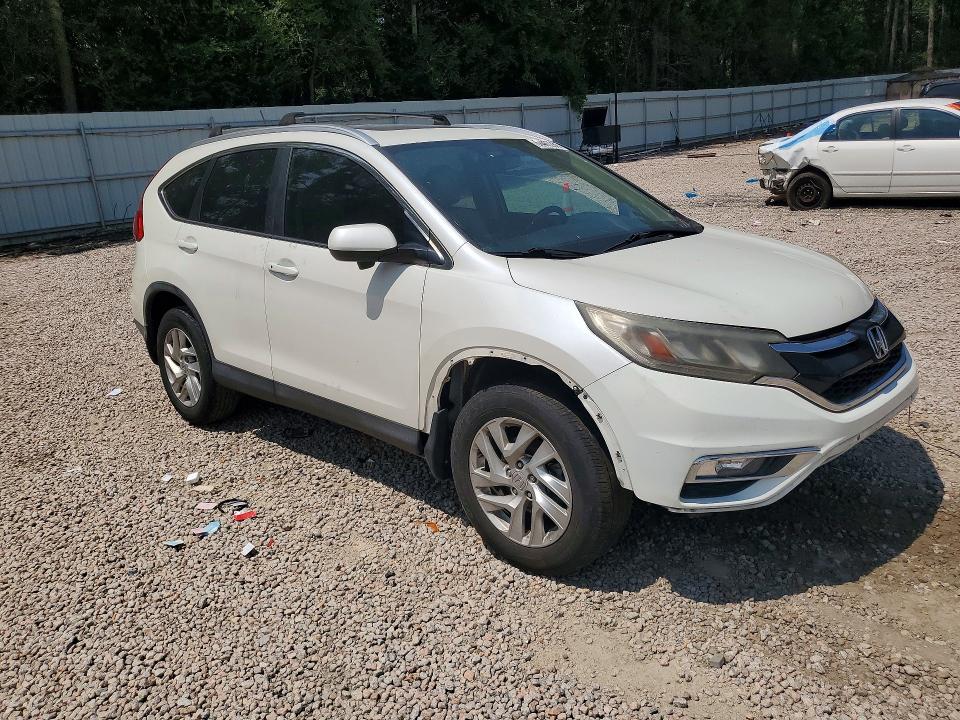Photo 4 from auction – 2015 HONDA CR-V with VIN 5J6RM4H79FL035528