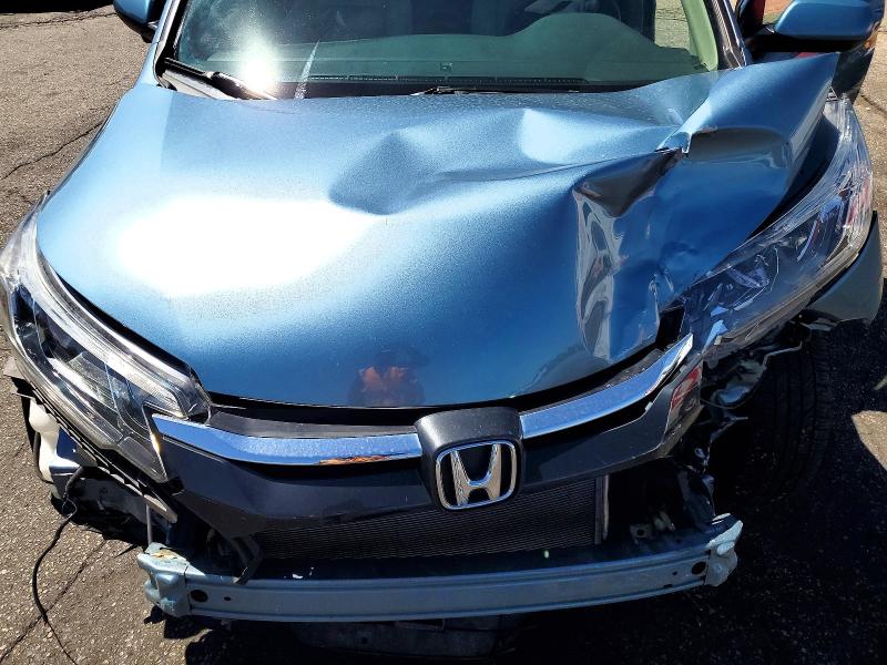 Photo 11 from auction – 2016 HONDA CR-V with VIN 2HKRM4H57GH667583