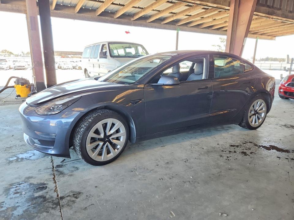 TESLA MODEL 3 2021 with VIN 5YJ3E1EA5MF876690 - Photo from auction