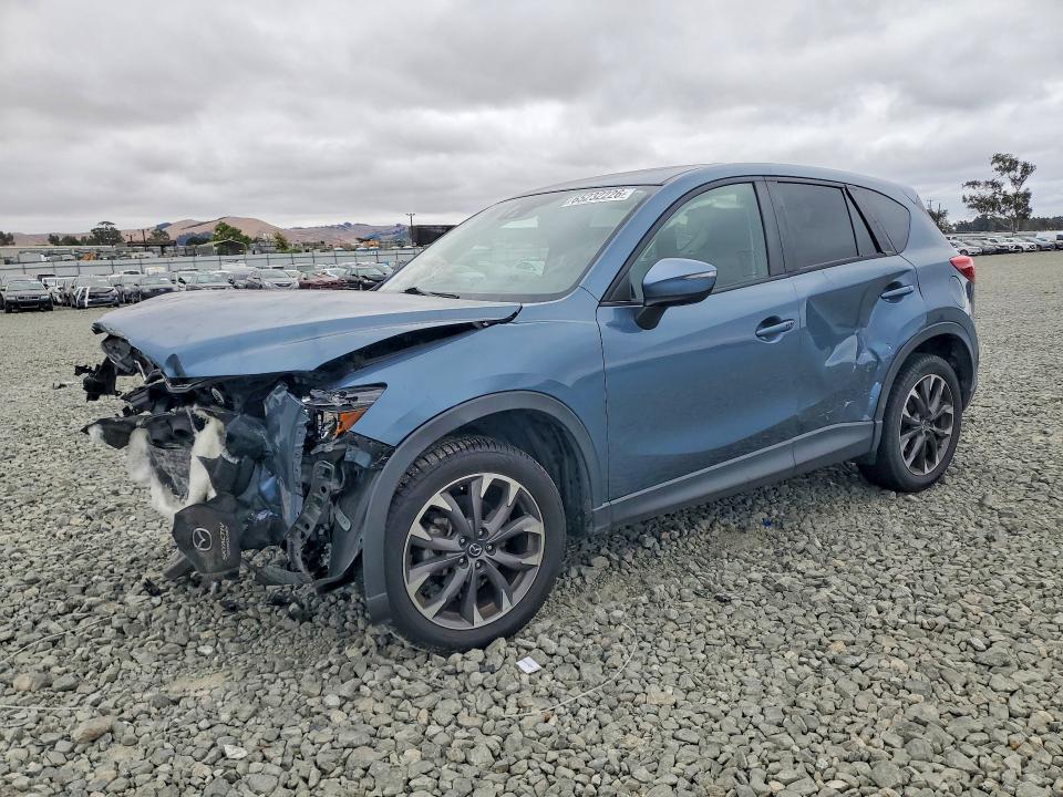 Снимка 1 от търг – 2016 MAZDA CX-5 с VIN JM3KE2DY9G0750357
