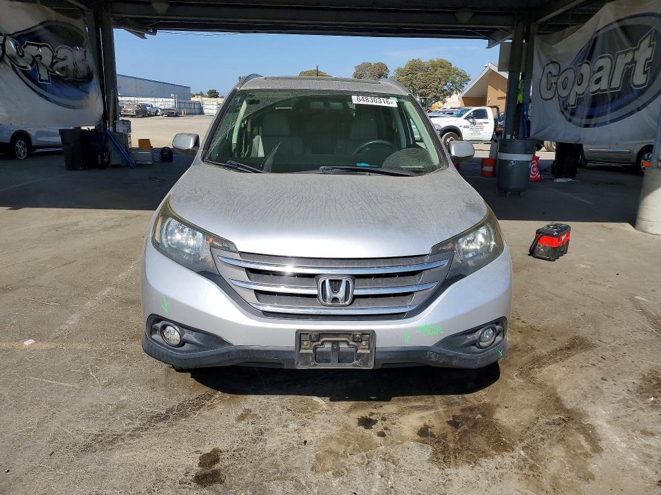 Photo 5 from auction – 2013 HONDA CR-V with VIN 2HKRM4H72DH678696