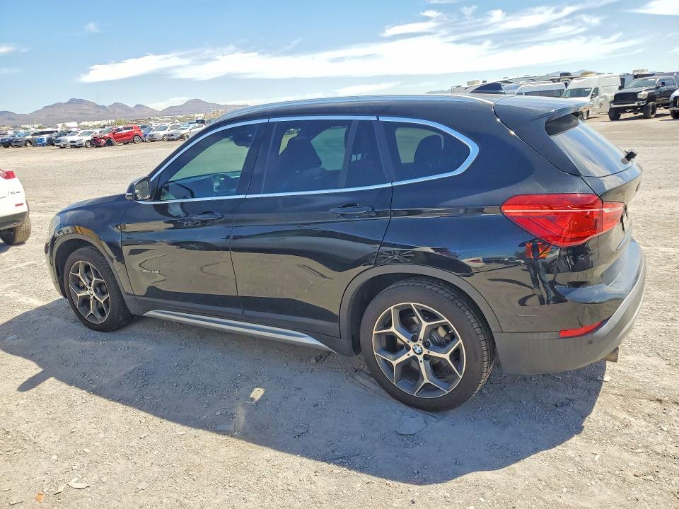 Photo 2 from auction – 2016 BMW X1 with VIN WBXHT3C34GP888564