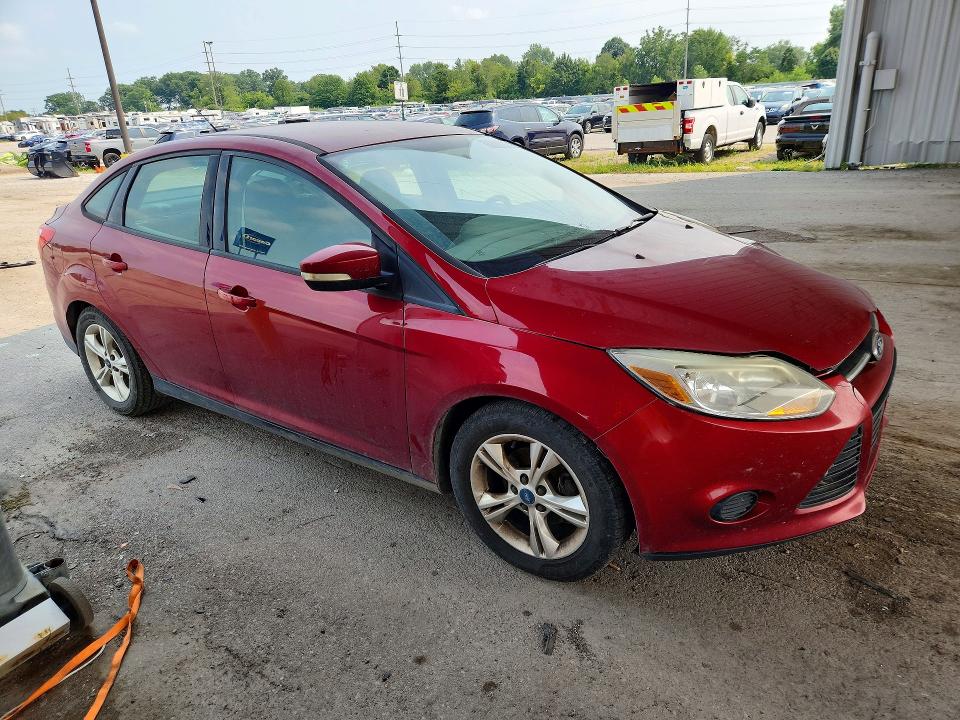 Photo 4 from auction – 2014 FORD FOCUS with VIN 1FADP3F26EL128469