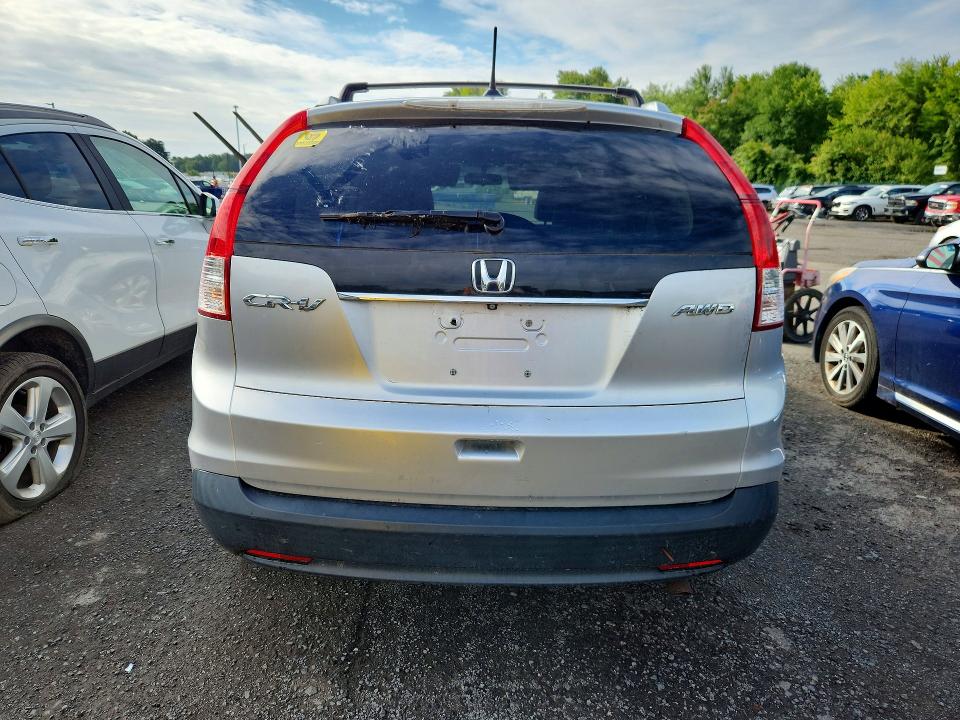 Photo 6 from auction – 2014 HONDA CR-V with VIN 2HKRM4H74EH640520