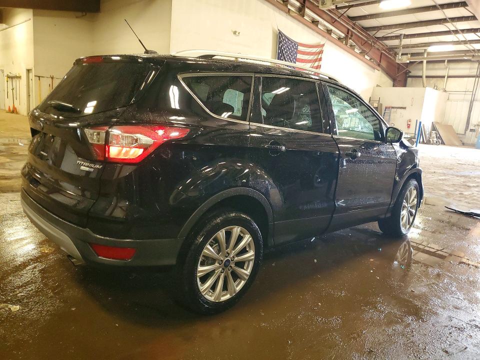 Photo 3 from auction – 2017 FORD ESCAPE with VIN 1FMCU9J90HUE10252