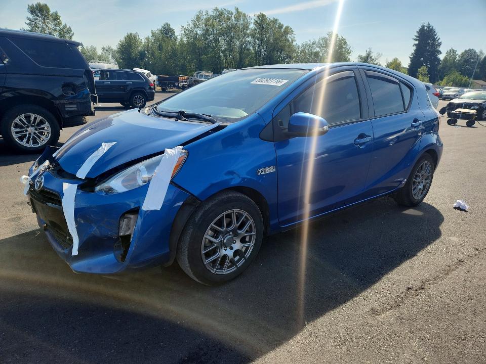 Photo 1 from auction – 2015 TOYOTA PRIUS C with VIN JTDKDTB35F1583092