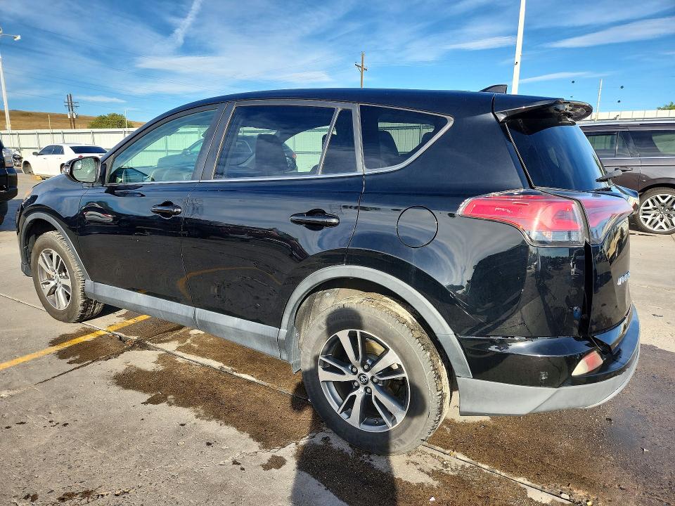 Photo 2 from auction – 2018 TOYOTA RAV4 with VIN 2T3RFREV8JW792278