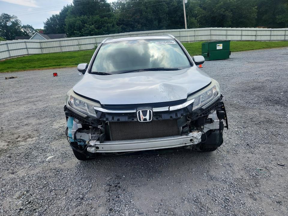 Photo 5 from auction – 2016 HONDA CR-V with VIN 2HKRM4H72GH673387