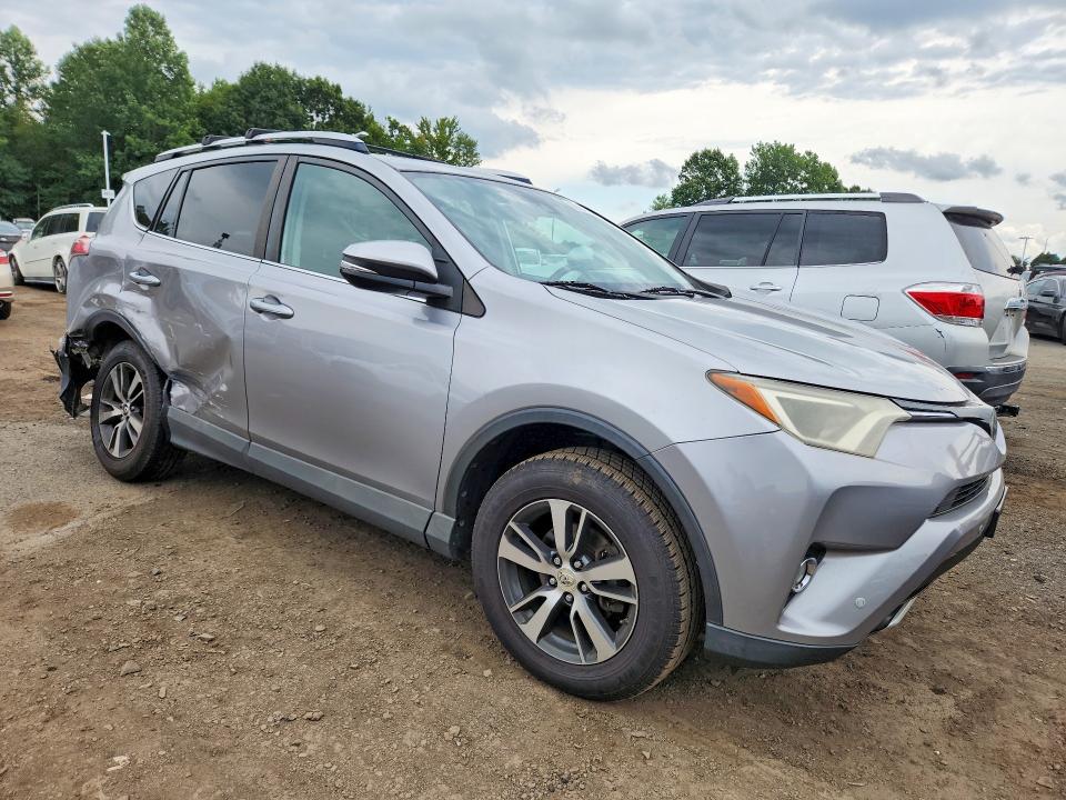 Photo 4 from auction – 2016 TOYOTA RAV4 with VIN 2T3RFREV1GW515352