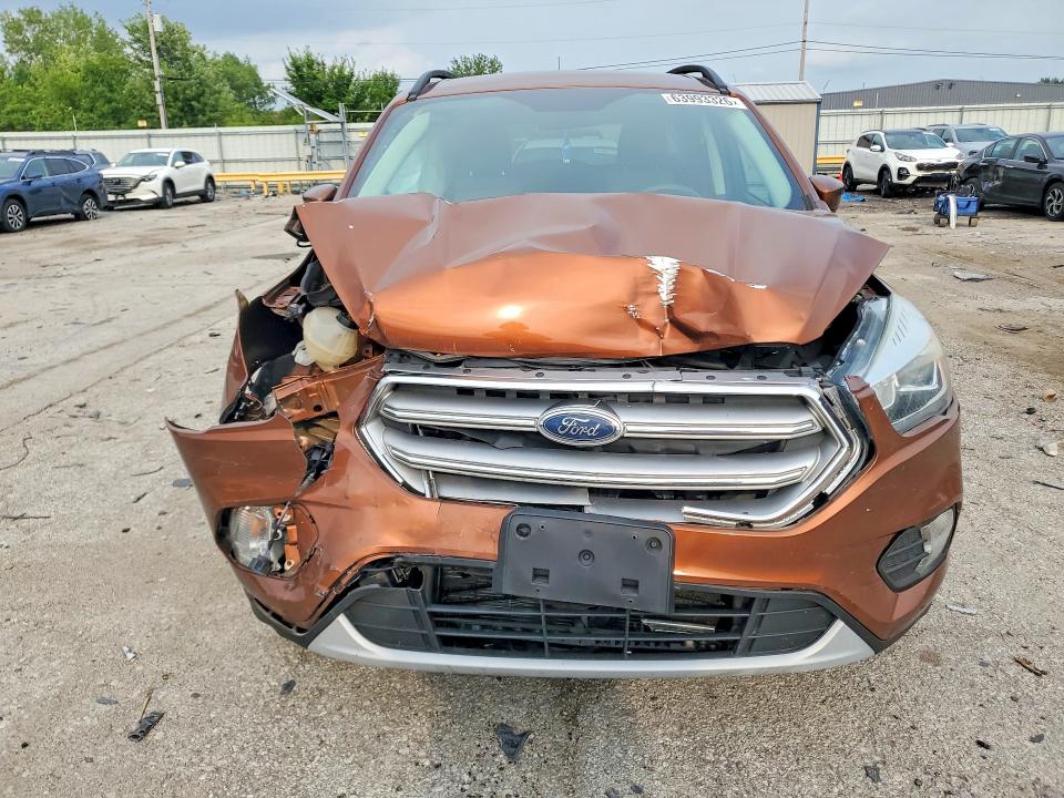 Photo 5 from auction – 2017 FORD ESCAPE with VIN 1FMCU9GD1HUC83992