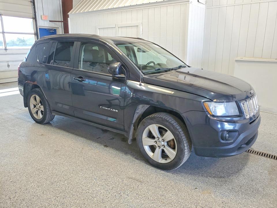 Photo 4 from auction – 2014 JEEP COMPASS with VIN 1C4NJDEB5ED623585