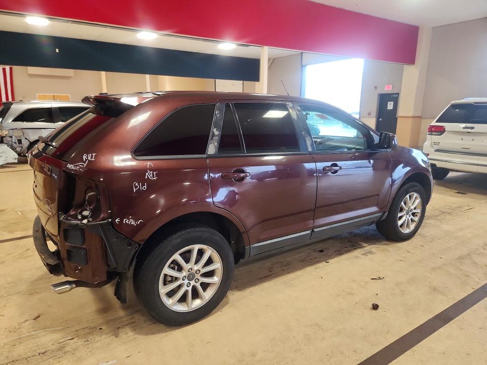 Photo 3 from auction – 2010 FORD EDGE with VIN 2FMDK4JC5ABA40565