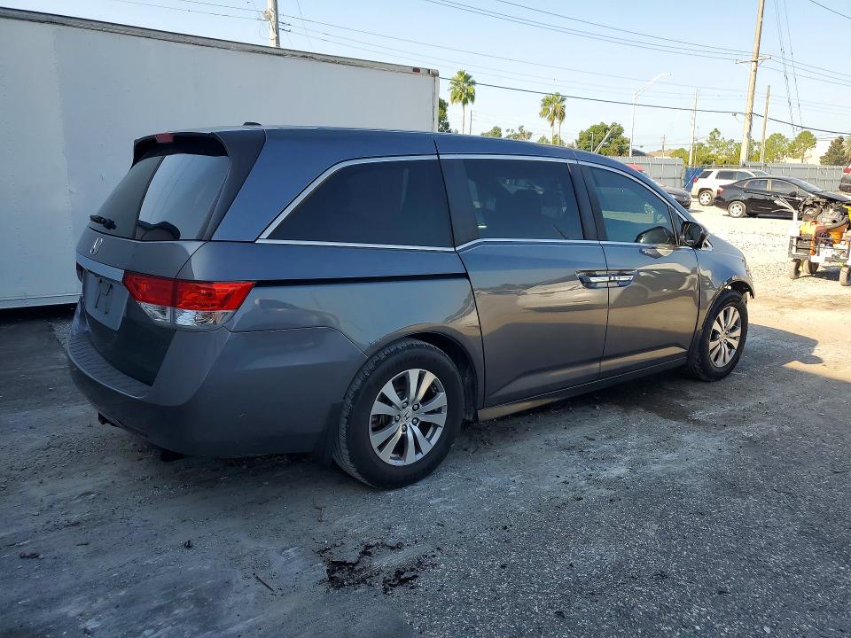 Photo 3 from auction – 2014 HONDA ODYSSEY with VIN 5FNRL5H6XEB096054
