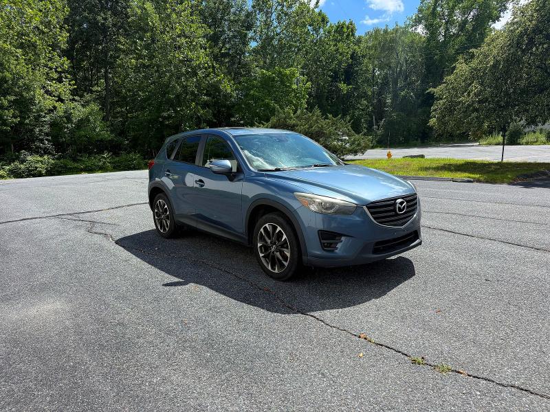 MAZDA CX-5 2016 with VIN JM3KE4DY6G0655895 - Photo from auction