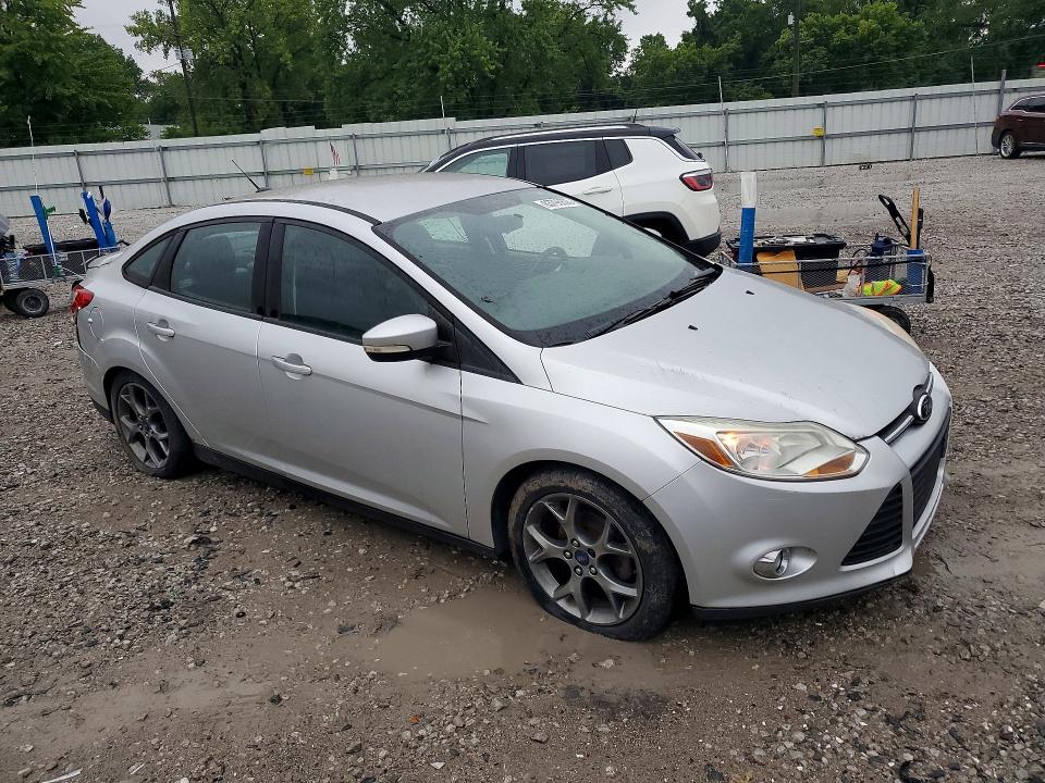 Photo 4 from auction – 2014 FORD FOCUS with VIN 1FADP3F23EL166760