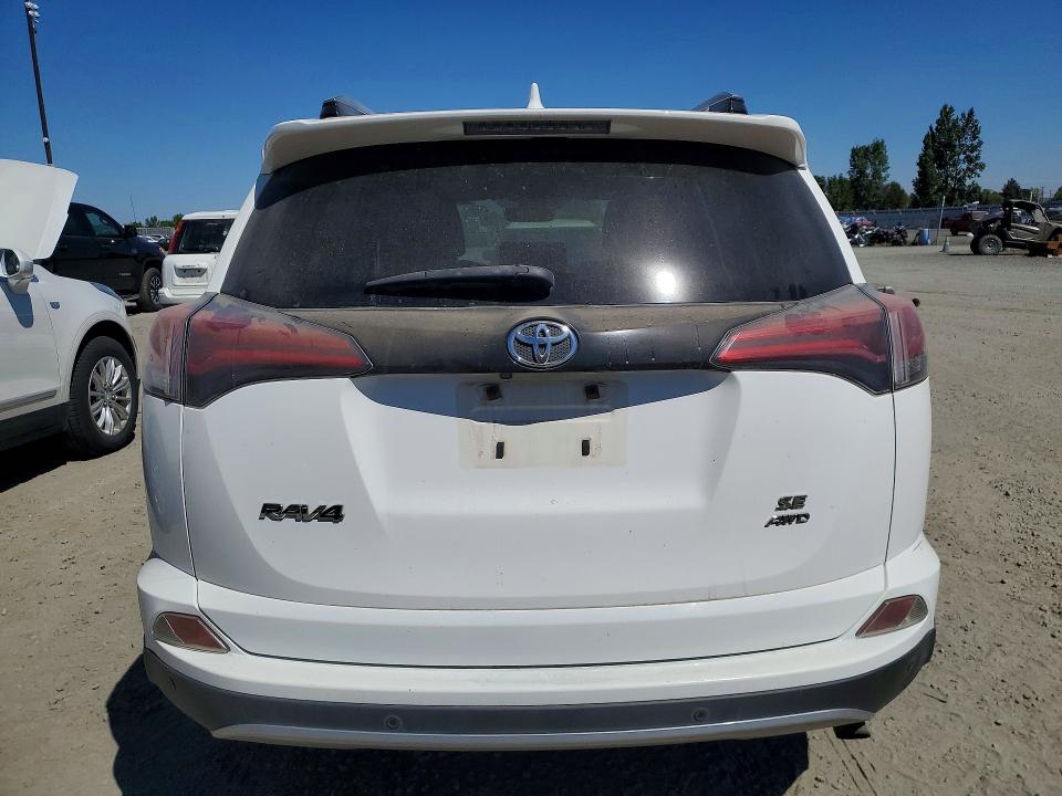 Photo 6 from auction – 2018 TOYOTA RAV4 with VIN JTMJFREV9JD234417