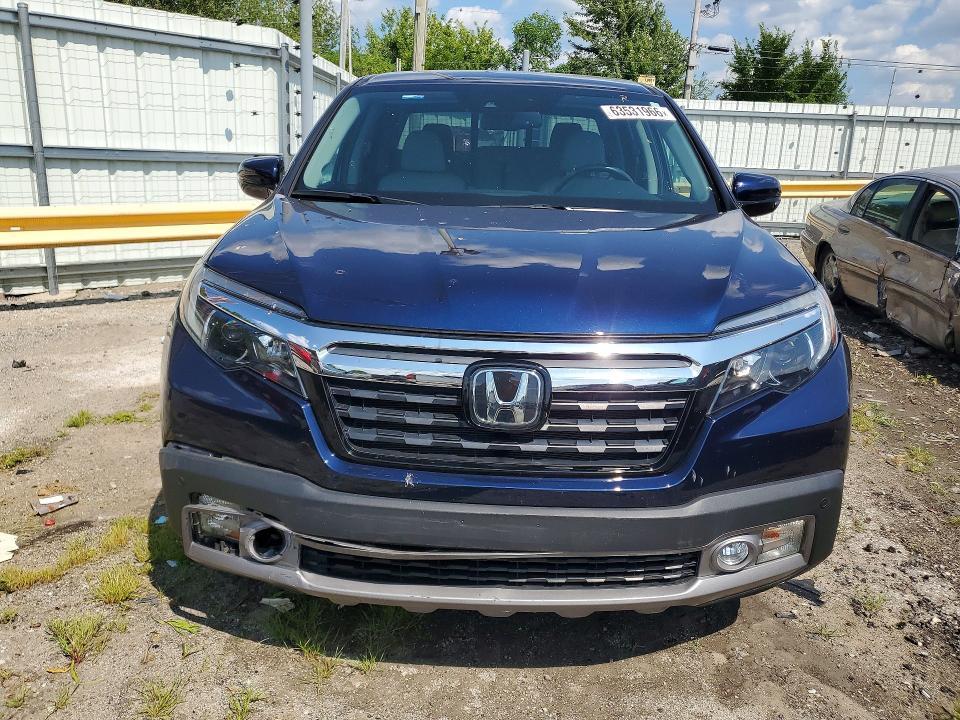 Photo 5 from auction – 2020 HONDA RIDGELINE with VIN 5FPYK3F77LB008922