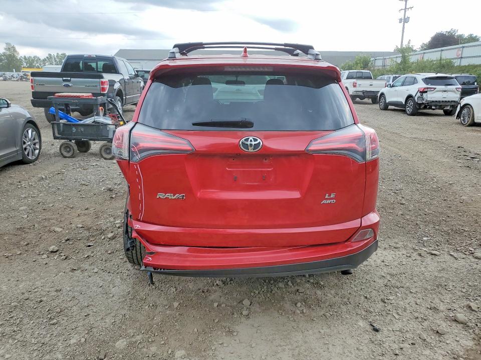 Photo 6 from auction – 2016 TOYOTA RAV4 with VIN JTMBFREV7GJ063794