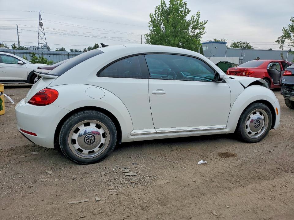 Photo 3 from auction – 2016 VOLKSWAGEN BEETLE with VIN 3VWJ07AT5GM604685