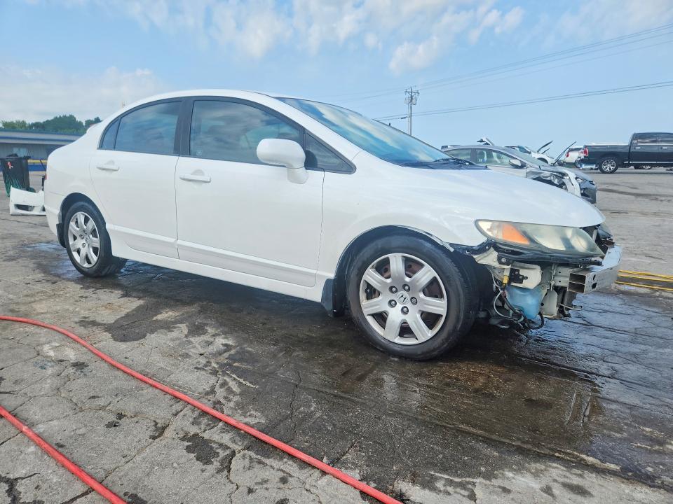 Photo 4 from auction – 2011 HONDA CIVIC with VIN 19XFA1F55BE006712