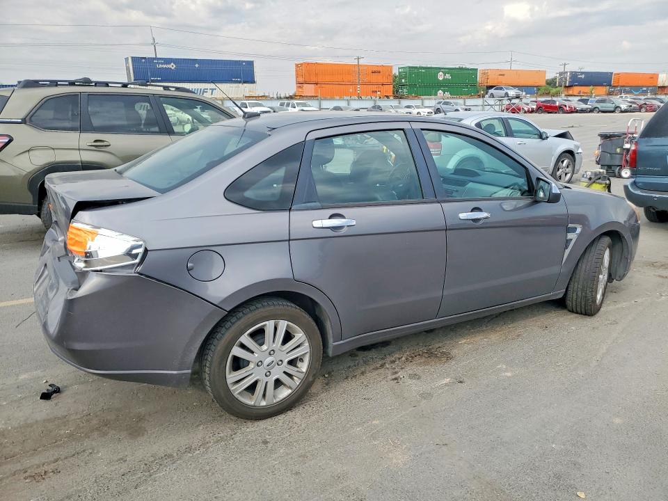 Photo 3 from auction – 2009 FORD FOCUS with VIN 1FAHP37N69W200611