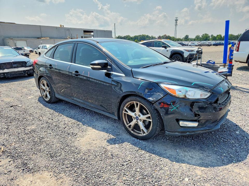 Photo 4 from auction – 2015 FORD FOCUS with VIN 1FADP3J24FL232838