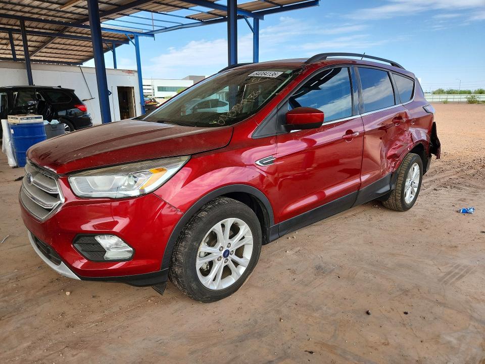FORD ESCAPE 2018 with VIN 1FMCU0HDXJUB44377 - Photo from auction