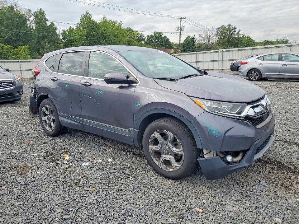 Photo 4 from auction – 2019 HONDA CR-V with VIN 2HKRW2H81KH634256