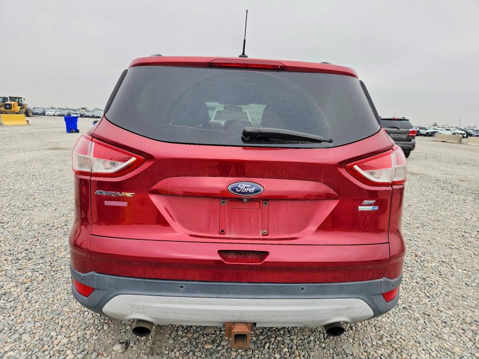 Photo 6 from auction – 2014 FORD ESCAPE with VIN 1FMCU9G97EUB46479