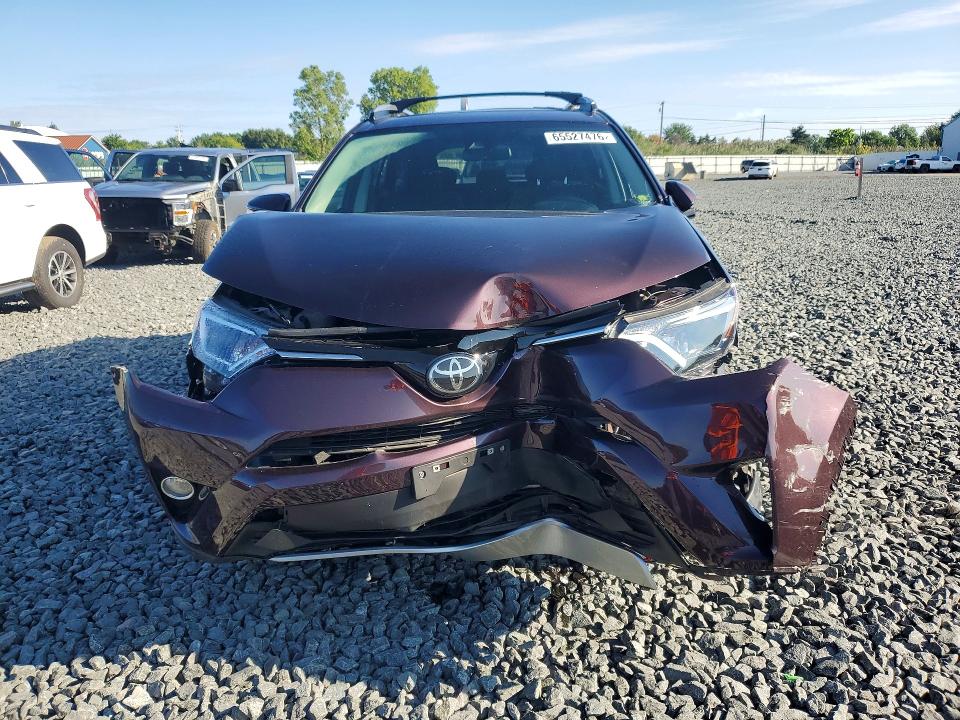 Photo 5 from auction – 2018 TOYOTA RAV4 with VIN 2T3RFREV2JW770230