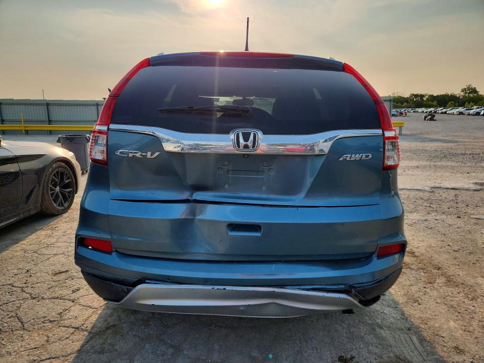 Photo 6 from auction – 2015 HONDA CR-V with VIN 2HKRM4H76FH686478