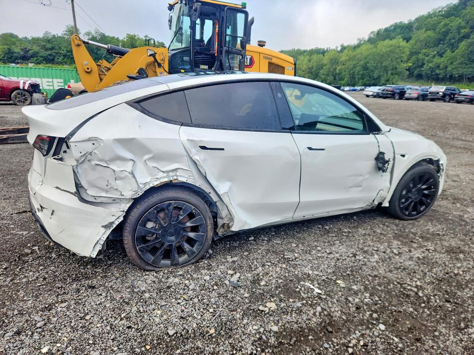 Photo 3 from auction – 2023 TESLA MODEL Y with VIN 7SAYGDEE7PF896256