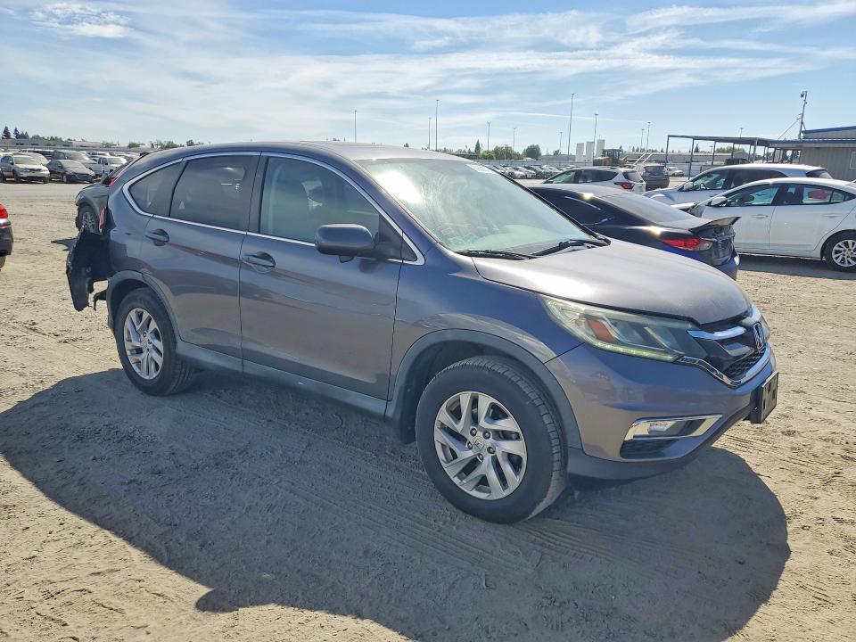 Photo 4 from auction – 2015 HONDA CR-V with VIN 2HKRM4H53FH640962