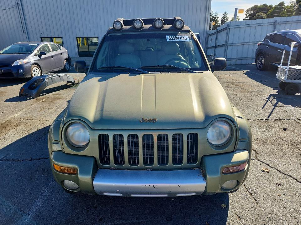 Photo 5 from auction – 2003 JEEP LIBERTY with VIN 1J4GL38K13W554382