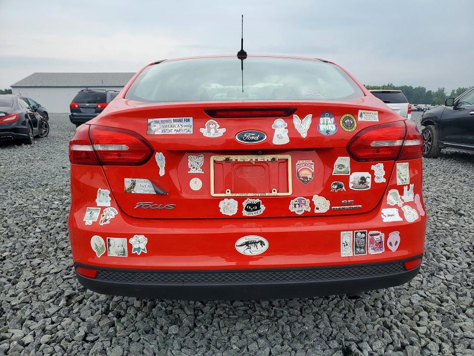 Photo 6 from auction – 2016 FORD FOCUS with VIN 1FADP3F21GL398177