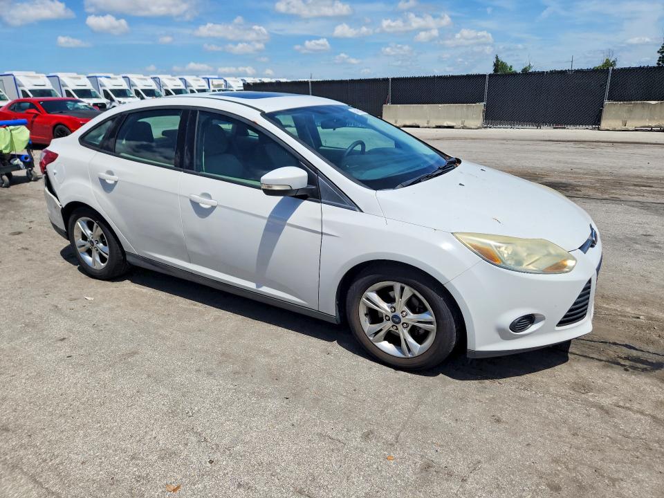 Photo 4 from auction – 2014 FORD FOCUS with VIN 1FADP3F23EL227198