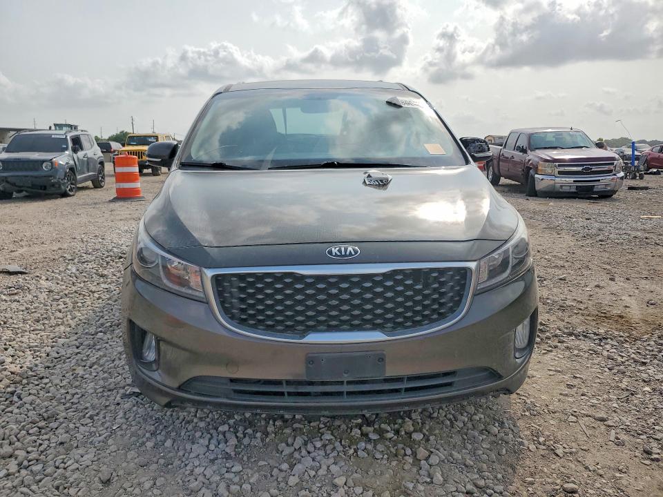 Photo 5 from auction – 2015 KIA SEDONA with VIN KNDMC5C11F6023691