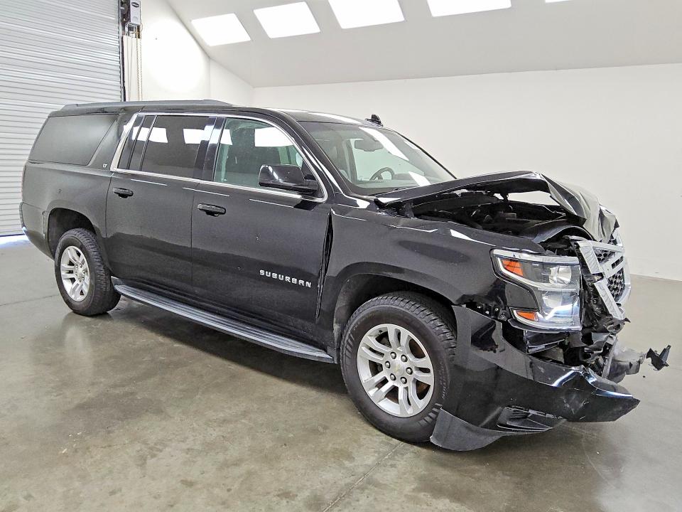 Photo 4 from auction – 2018 CHEVROLET SUBURBAN with VIN 1GNSCHKC9JR350396