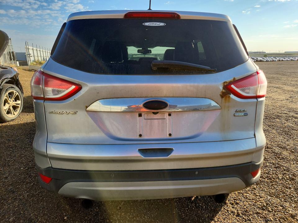 Photo 6 from auction – 2013 FORD ESCAPE with VIN 1FMCU9H9XDUC57525