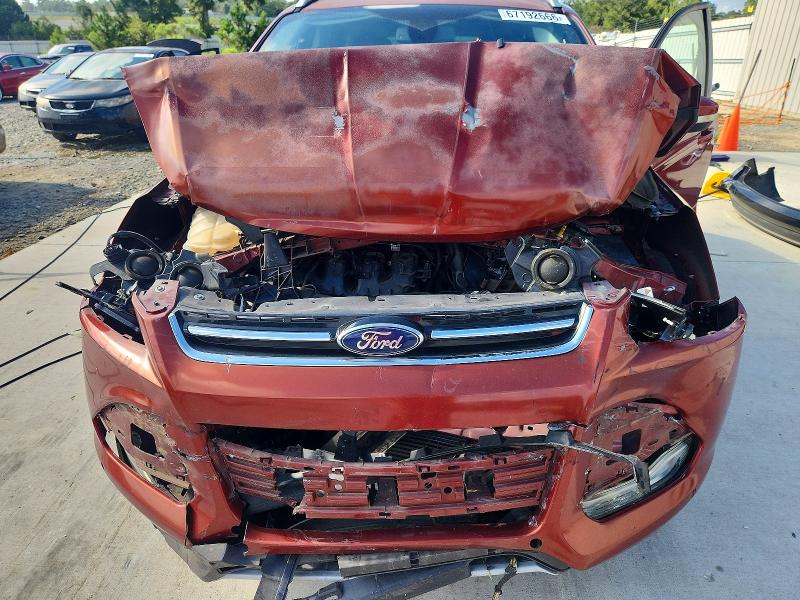 Photo 12 from auction – 2014 FORD ESCAPE with VIN 1FMCU0J99EUE23914