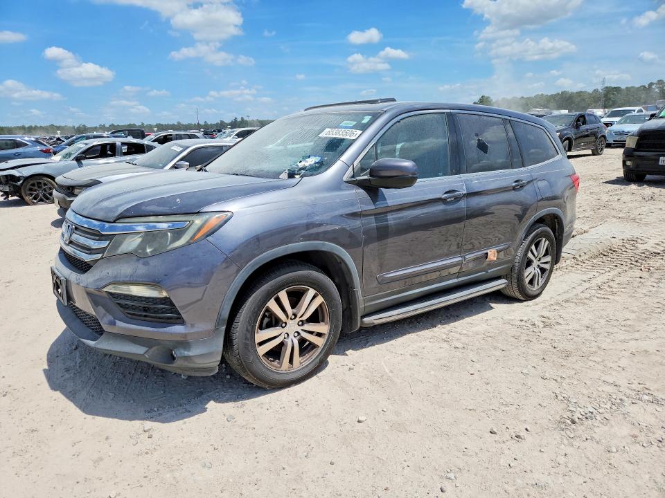 HONDA PILOT 2016 with VIN 5FNYF5H58GB014352 - Photo from auction