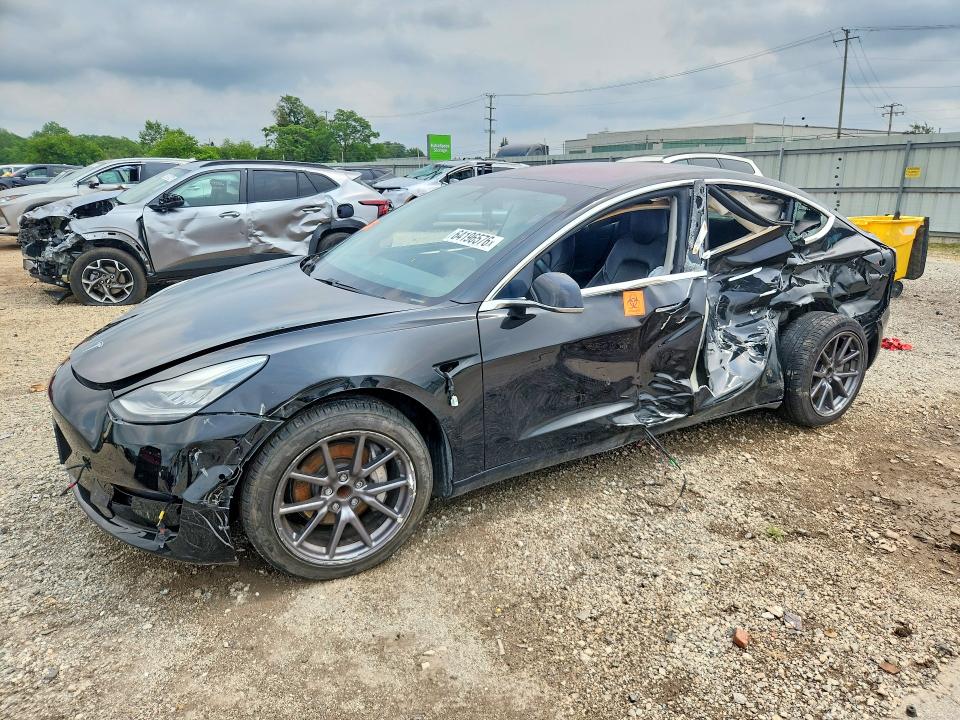 TESLA MODEL 3 2018 with VIN 5YJ3E1EA0JF151980 - Photo from auction