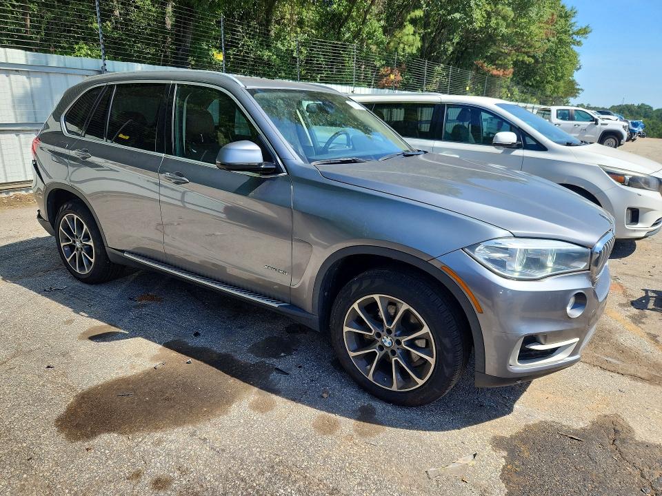 Photo 4 from auction – 2016 BMW X5 with VIN 5UXKR0C5XG0U10853