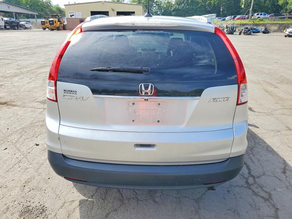 Photo 6 from auction – 2014 HONDA CR-V with VIN 2HKRM4H77EH626501