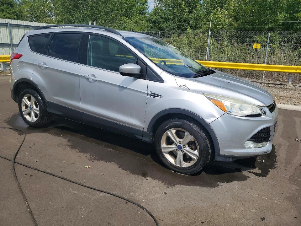 Photo 4 from auction – 2015 FORD ESCAPE with VIN 1FMCU9G9XFUA47270