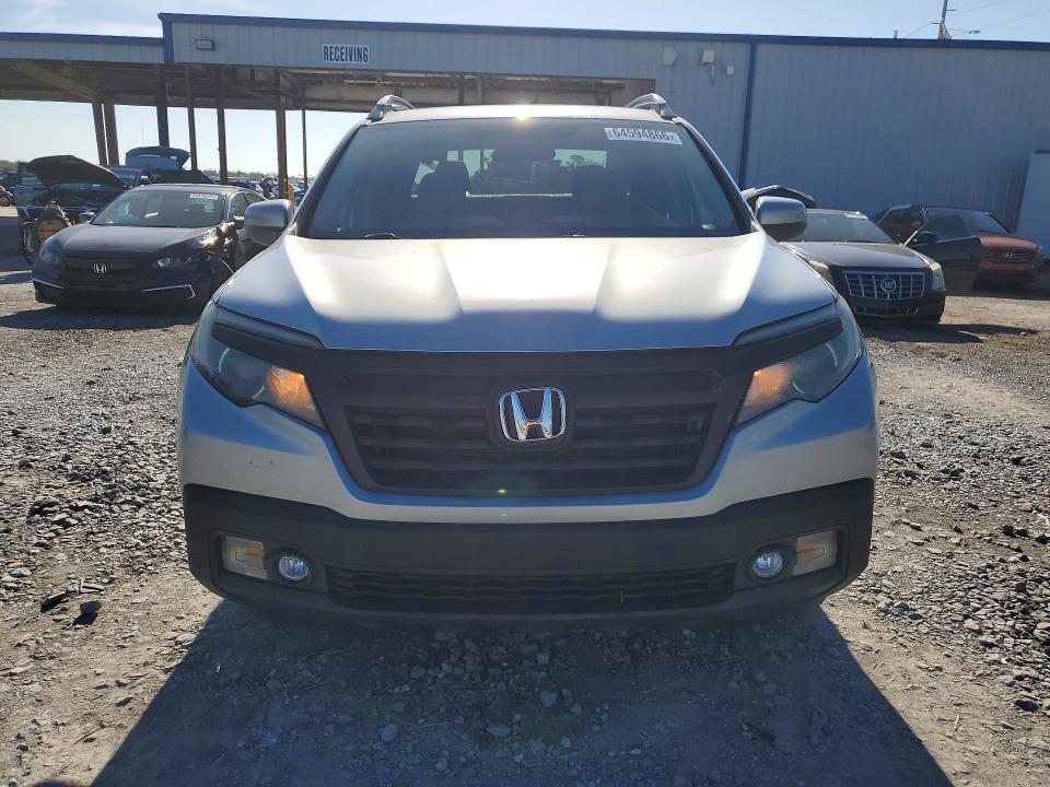 Photo 5 from auction – 2017 HONDA RIDGELINE with VIN 5FPYK2F57HB001520