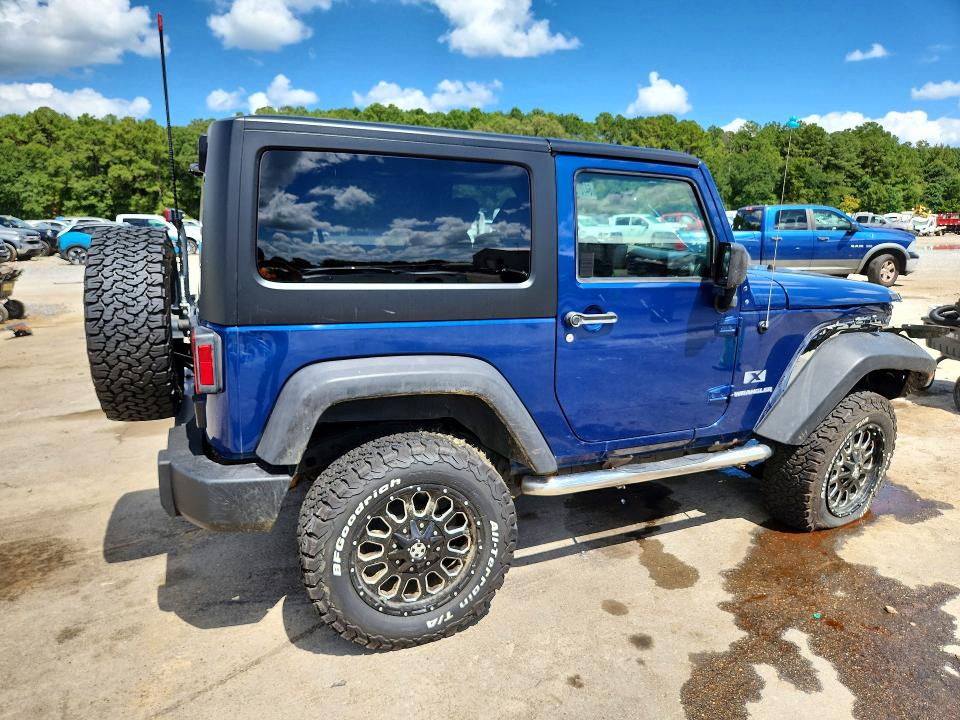 Photo 3 from auction – 2009 JEEP WRANGLER with VIN 1J4FA24199L762772